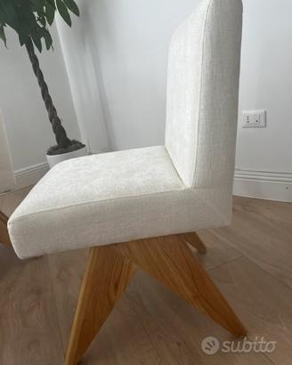 Sedie imbottite con gambe in legno