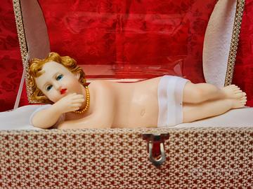 Statuetta di Gesù Bambino in cera con carillon