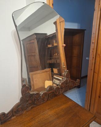 Specchio con cornice intarsiata
