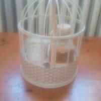 gabbia con candela profumata