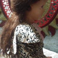 Bambola anni 50 finemente vestita