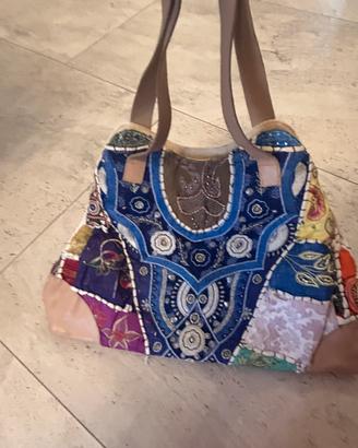 Borsa in canvas e pelle