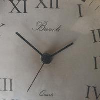 Orologio da parete in ferro battuto vintage