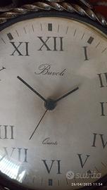 Orologio da parete in ferro battuto vintage