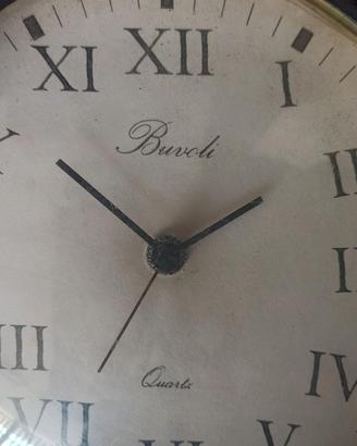 Orologio da parete in ferro battuto vintage
