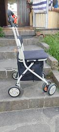 Deambulatore rollator con seggiola contenitore