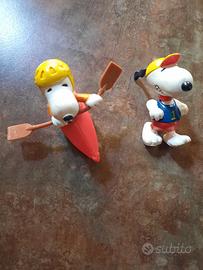 Snoopy Peanuts e Puffi Peyo Snorky Astrosniks