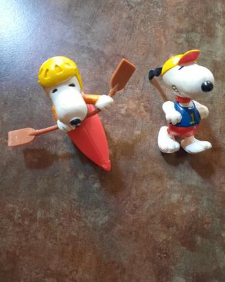 Snoopy Peanuts e Puffi Peyo Snorky Astrosniks