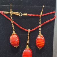 collana ciondolo con orecchini