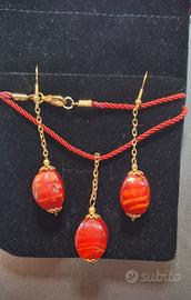 collana ciondolo con orecchini