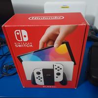 Nintendo switch oled bianca + giochi + accesori