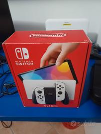 Nintendo switch oled bianca + giochi + accesori