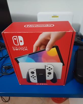 Nintendo switch oled bianca + giochi + accesori