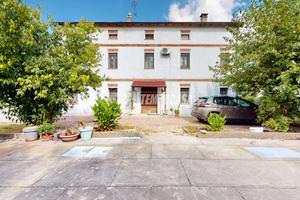 Trilocale al piano terra con ampi spazi e basso co