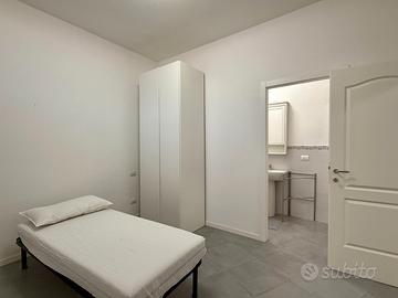 Camera con bagno privato