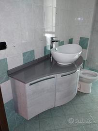 Mobile bagno curvo con lavabo appoggio