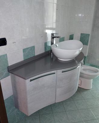 Mobile bagno curvo con lavabo appoggio