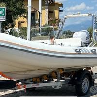 Gommone, motore e rimorchio