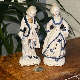 Statuine in porcellana di uomo e donna