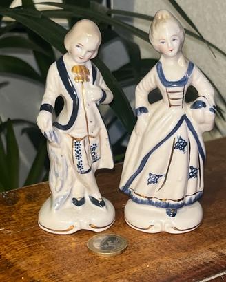 Statuine in porcellana di uomo e donna