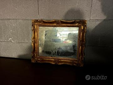 Specchio con cornice colore oro