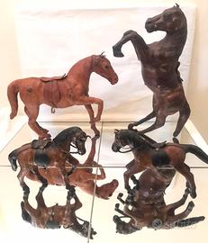 ?4 sculture in legno (2grandi-2piu' piccole),