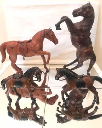 ?4 sculture in legno (2grandi-2piu' piccole),