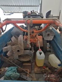 Moto zappa con attrezzatura varia e carrello