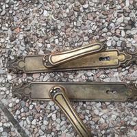 quattro maniglie per porte da interno vintage
