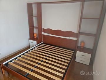 Camera Matrimoniale Ponte Libreria e Armadio