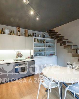 Appartamento di 100 m² con 3 locali e posto auto a