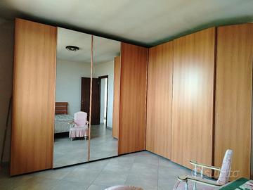 armadio angolo con cassettiera interna