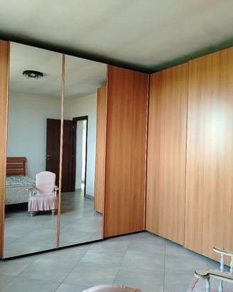 armadio angolo con cassettiera interna