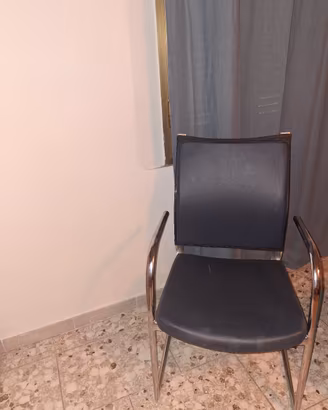 Sedia di pele e inox 