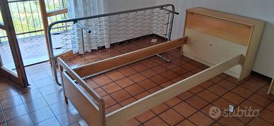 letto con testata continitore, rete a molle 