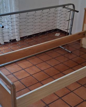 letto con testata continitore, rete a molle 