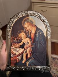 Cornice lavorara in argento, stampa su legno