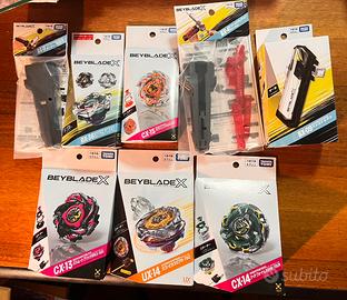 Beyblade x vari trottole e accessori