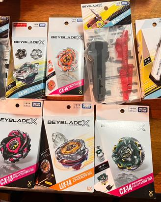 Beyblade x vari trottole e accessori