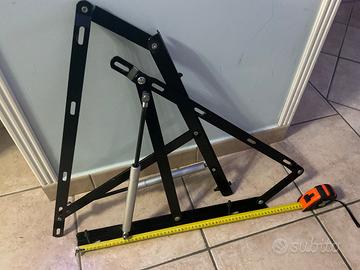 Sistema sollevamento per letto contenitore