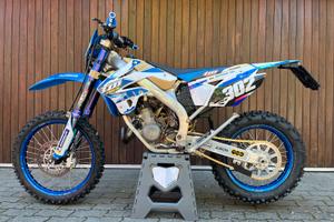 TM 125 EN