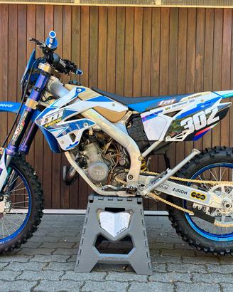 TM 125 EN