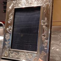 cornice da bimb* in argento 