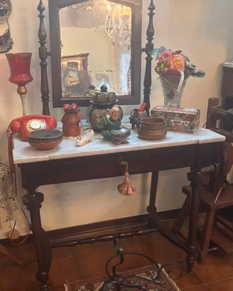 Consolle d’epoca in legno restaurata