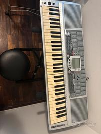 Pianola con asse e sgabello