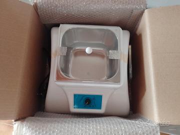 Scaldaerbe elettrico per trattamenti ayurvedici