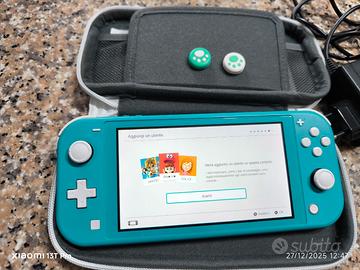 Switch Lite turchese +custodia da viaggio +1 Gioco