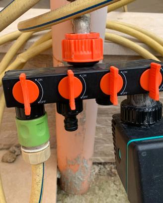 Adattatore per rubinetto in PVC a 4 uscite