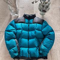 Piumino The North Face blu con monogramma