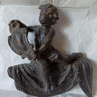 Coppia di alari da camino in bronzo imbrunito